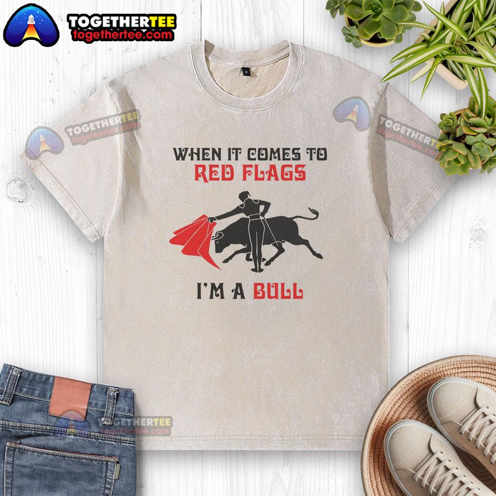 Alt Text: Red flags graphic on a washed t-shirt, featuring the phrase 'Nice When It Comes To Red Flags' in bold lettering.