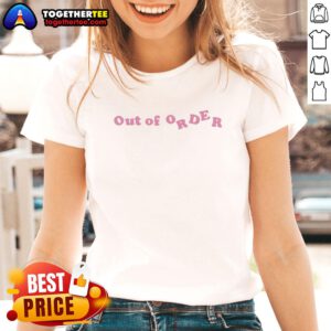 Alt Text: Adwoa Aboah in an Out of Order pink text ladies tee, showcasing a stylish and bold streetwear look.