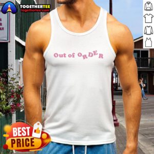 Adwoa Aboah in an Out Of Order pink text tank top, showcasing her unique style and fashion sense.