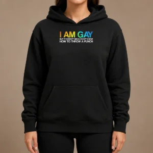 Top I Am Gay But It Doesn'T Mean I Don'T Know How To Throw A Punch hoodie in black with bold white text design