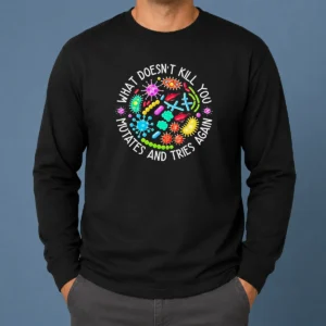 Good What Doesn'T Kill You Mutates And Tries Again Germs long sleeve shirt in black, featuring bold white text design