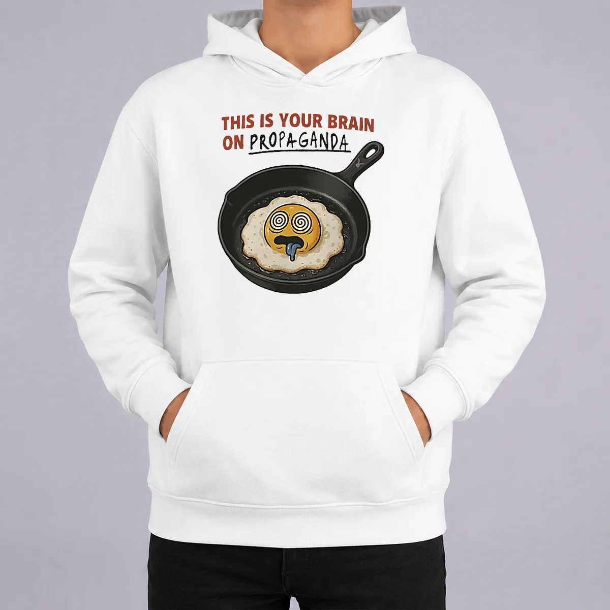 Original Fried Egg This Is Your Brain On Propaganda Hoodie Original Fried Egg This Is Your Brain On Propaganda Hoodie in black with front graphic print and drawstring hood